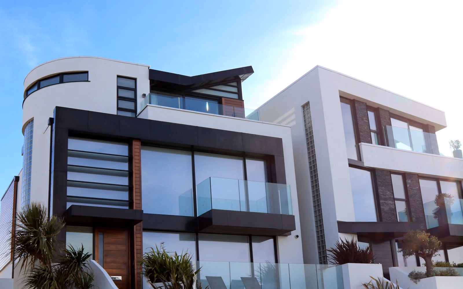 Modern multi-level villa exterior (placeholder photo)